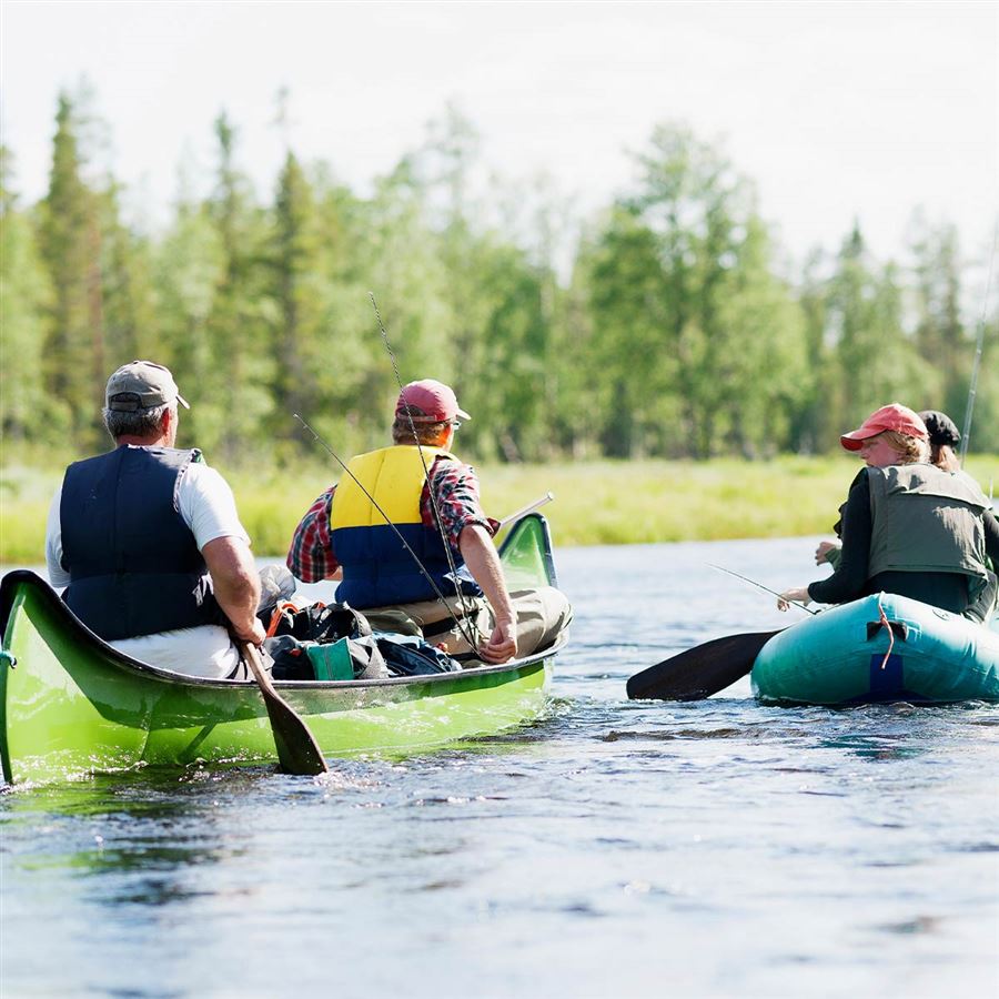 Friends out kayaking in the river