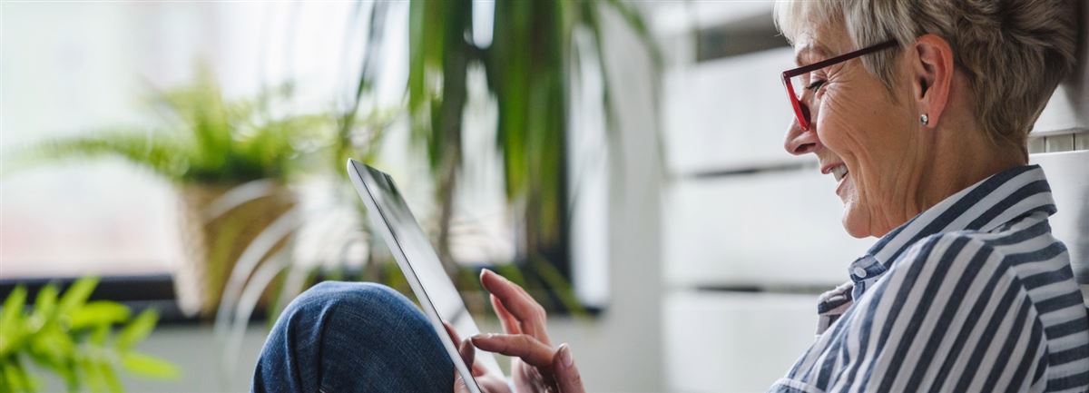 Older woman looking at ipad
