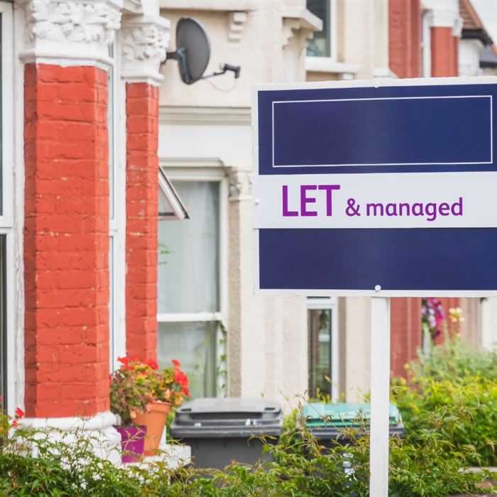 Home with to let sign outside