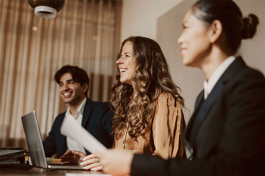 Happy colleagues in a meeting