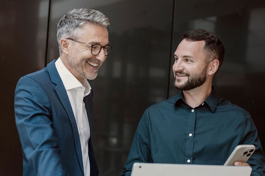 Male colleagues having a conversation