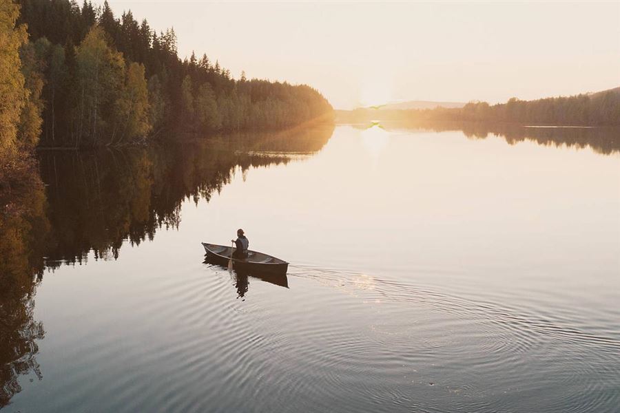 Woman paddling canoe