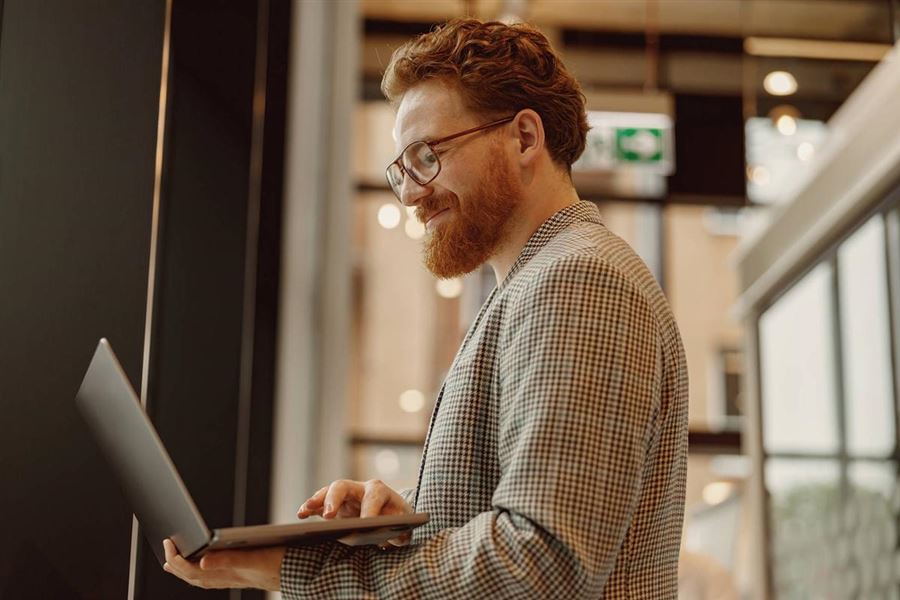 Man holding a laptop