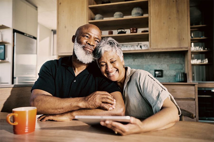 Older couple sat at table